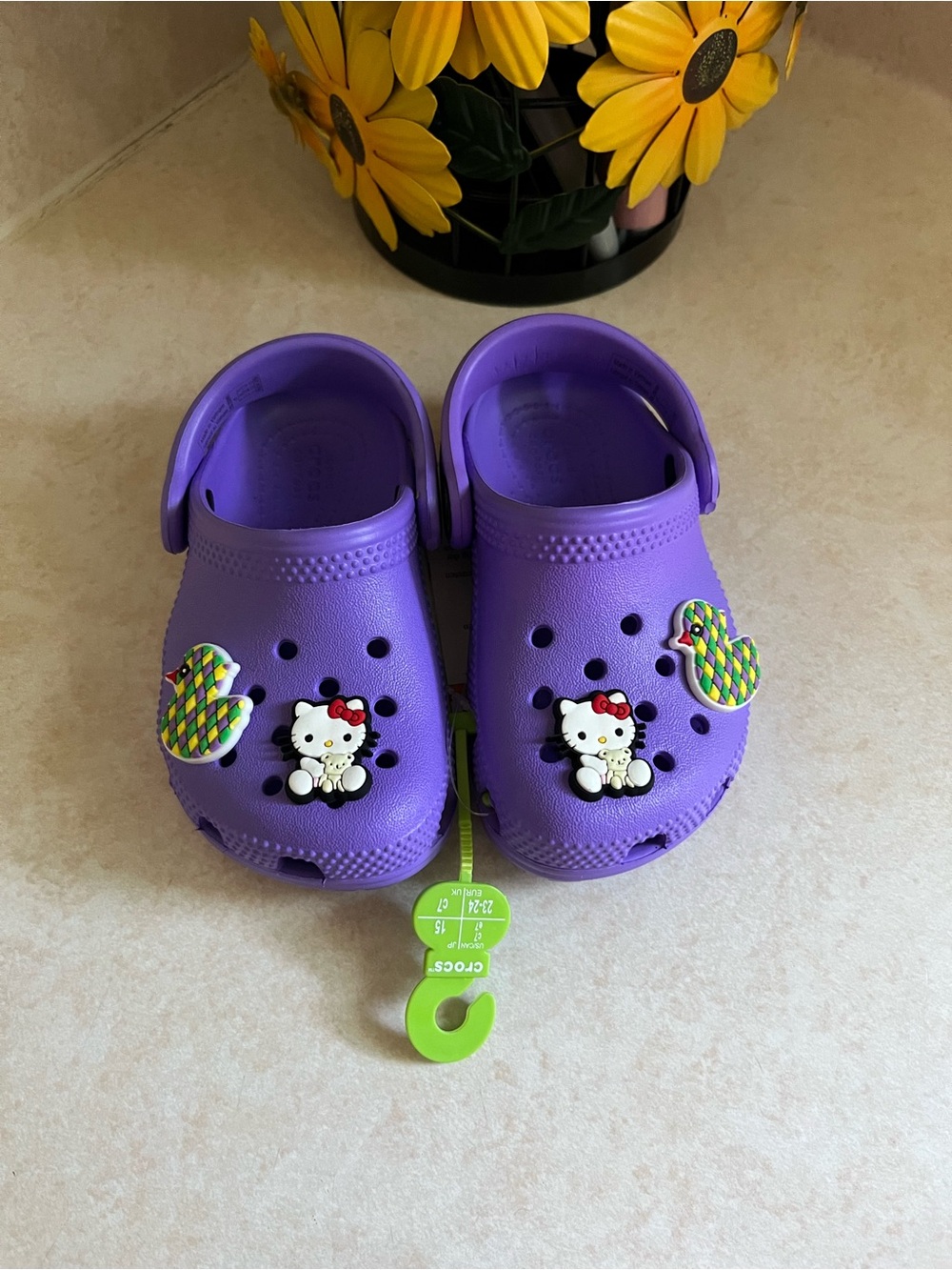 CROCS Kids Purple Clogs with Hello Kitty & Colorful Duck Charms Size C7